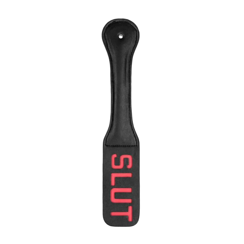 Shots Ouch! OU417BLK Palette - SLUT - Raquette en Faux Cuir - Convient à Tous - Noir